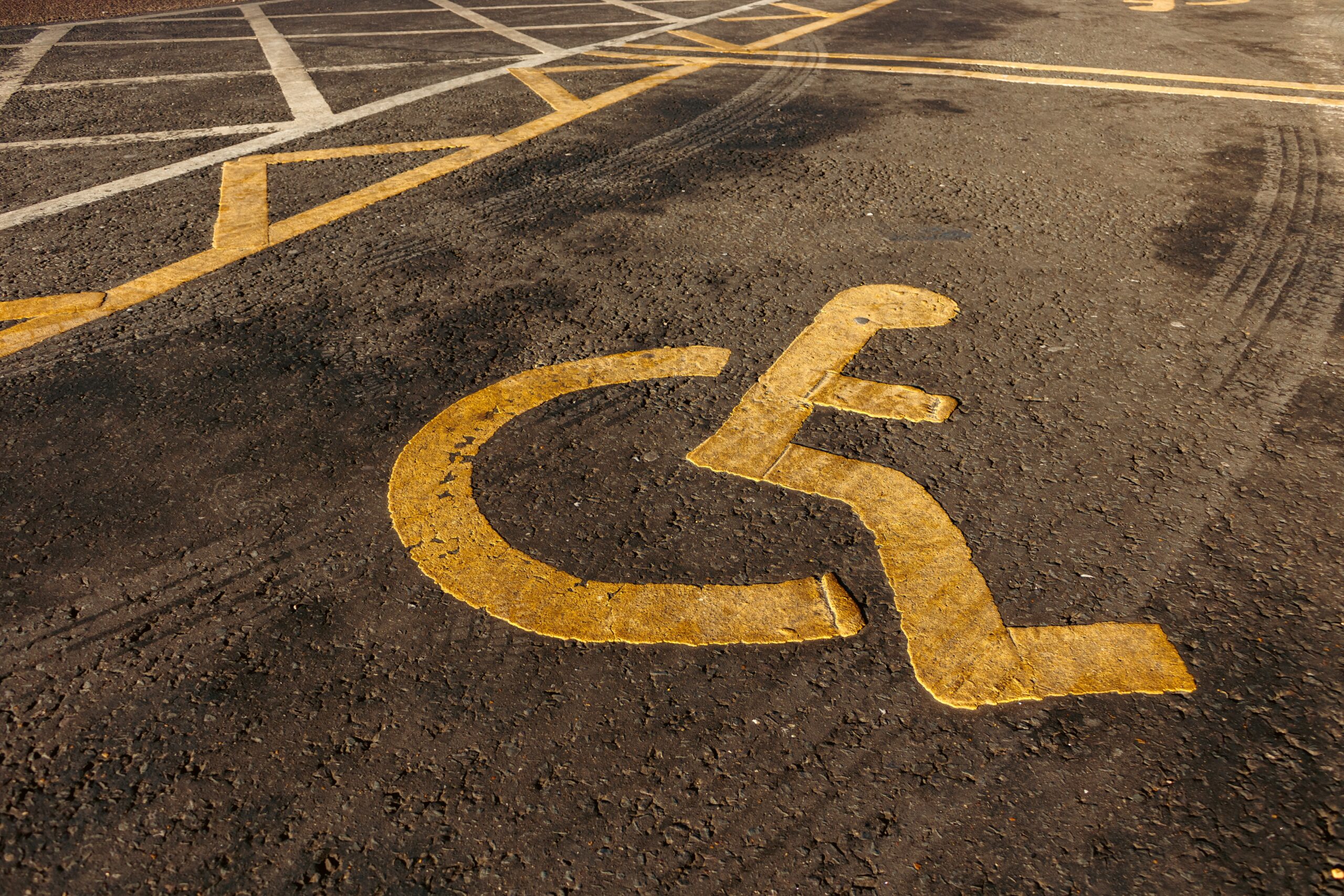 Disabled sign painted on a car park